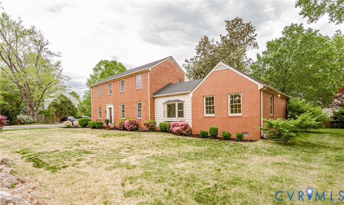 401 Caroline Street Ashland, VA 23005 - Photo 58 of 63 This brick property features a well-maintained law