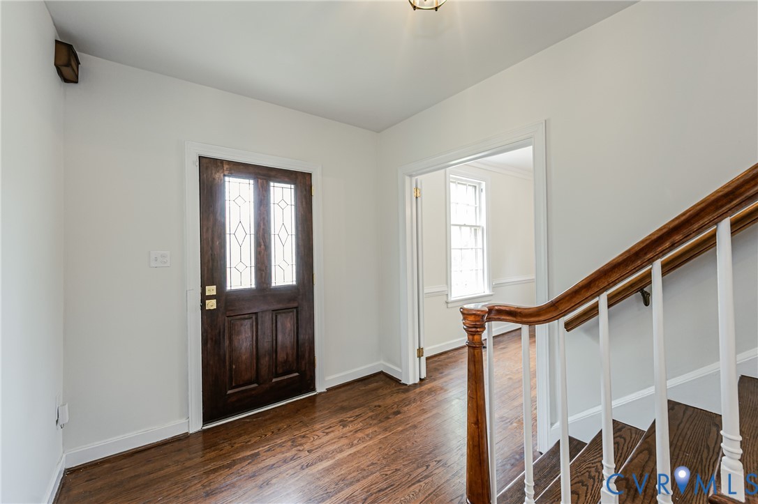 401 Caroline Street Ashland, VA 23005 - Photo 7 of 63 Entryway featuring a dark wood door with decorativ