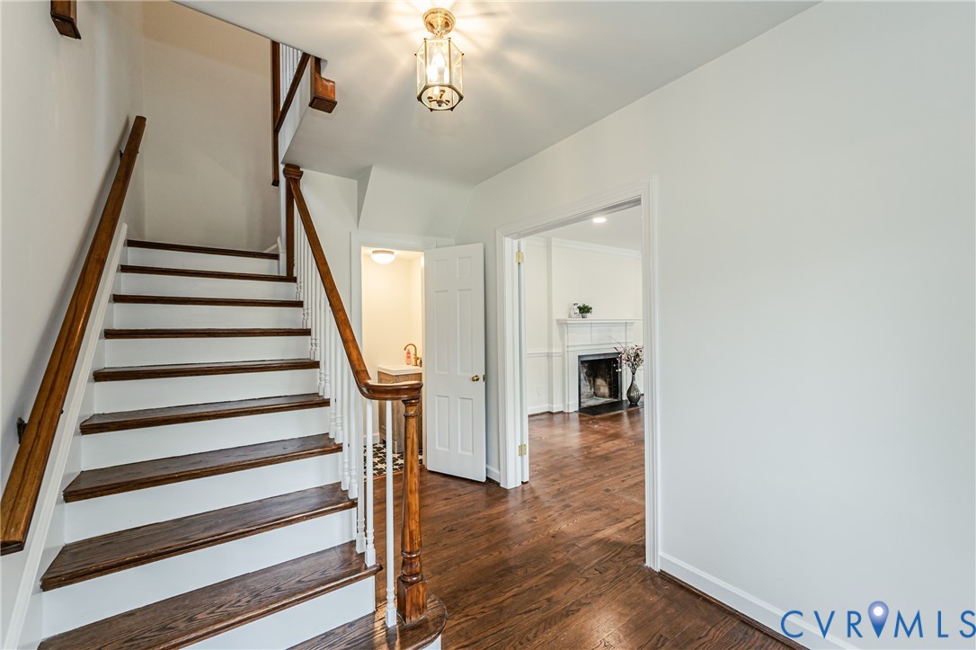 401 Caroline Street Ashland, VA 23005 - Photo 9 of 63 a view of a hallway with wooden floor and entryway