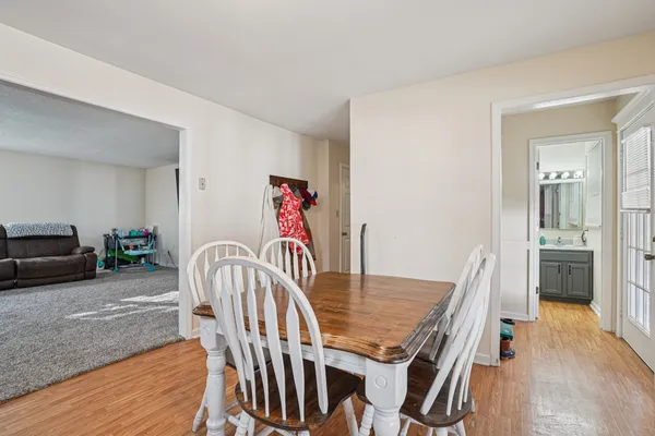 a bedroom with furniture and a window