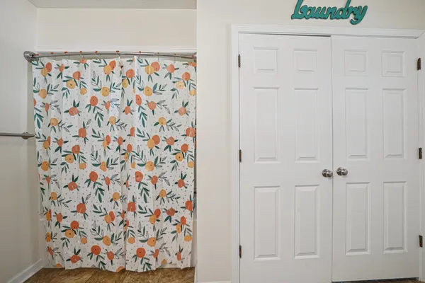 a view of a car park in front of house