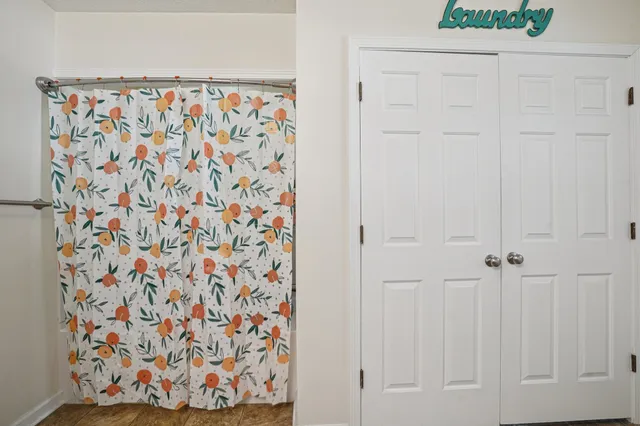 a view of a car park in front of house