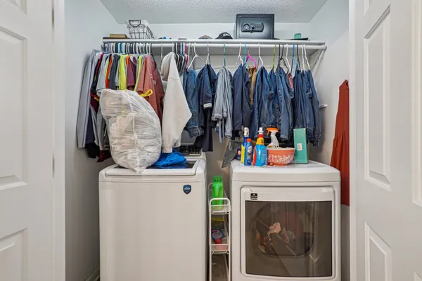 a view of a swimming pool and an outdoor seating