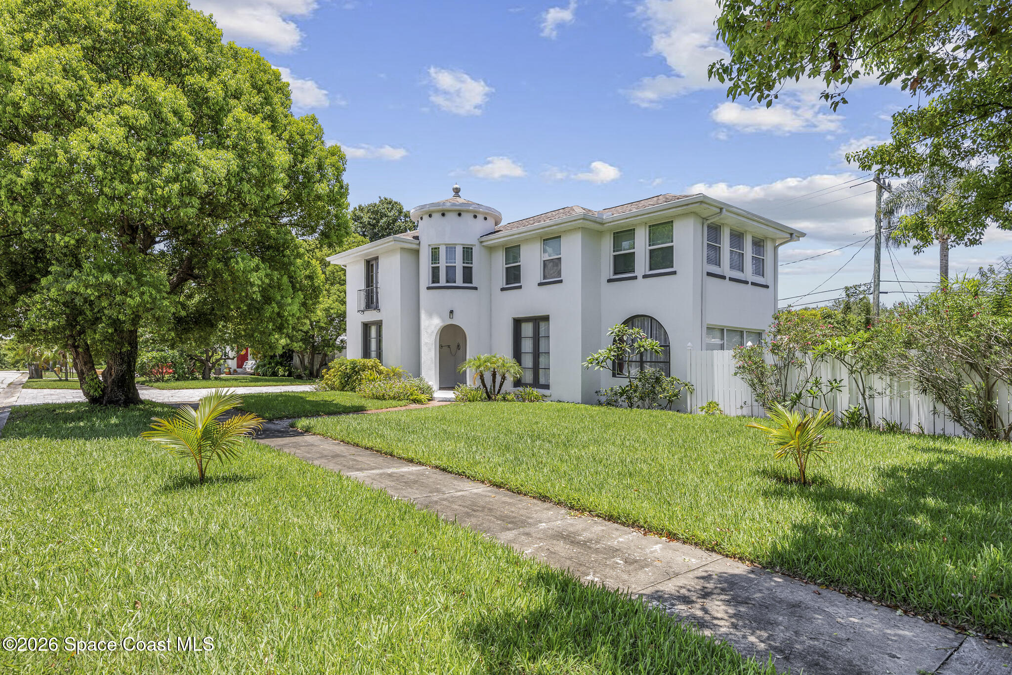 130 Valencia Road Rockledge, FL 32955 - Photo 5 of 72 a front view of house with yard and green space