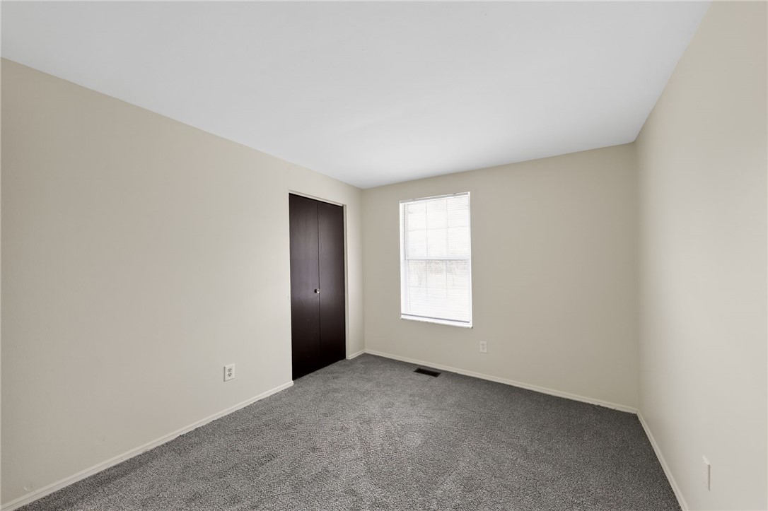 6070 Charlesgate Road Huber Heights, OH 45424 - Photo 17 of 29 This spacious bedroom offers ample natural light and a comfortable, inviting atmosphere.