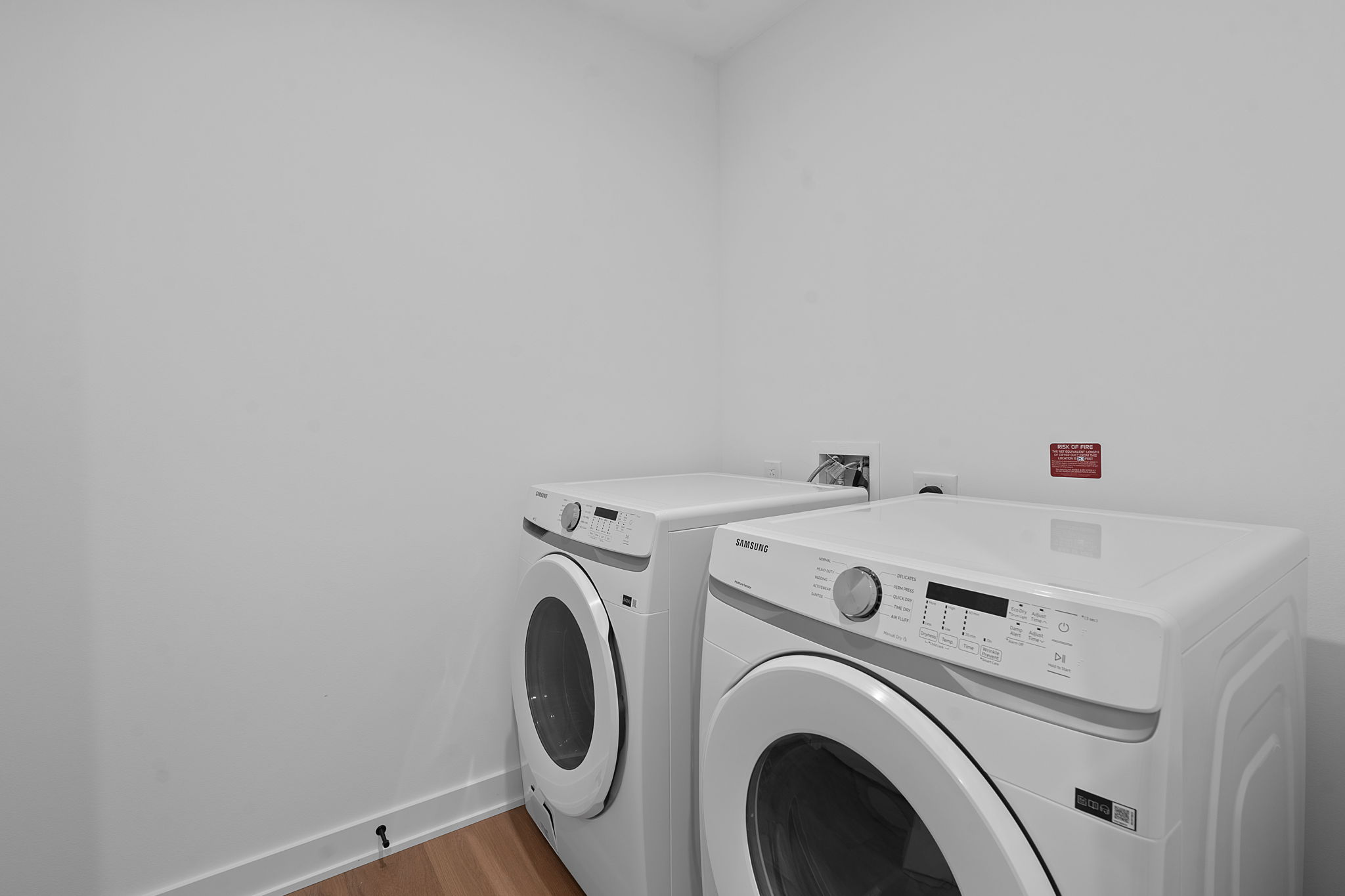 84 East Avenue, Unit 1801 Austin, TX 78701 - Photo 13 of 28 Representative Photo. Laundy room with Samsung washer and dryer included in unit