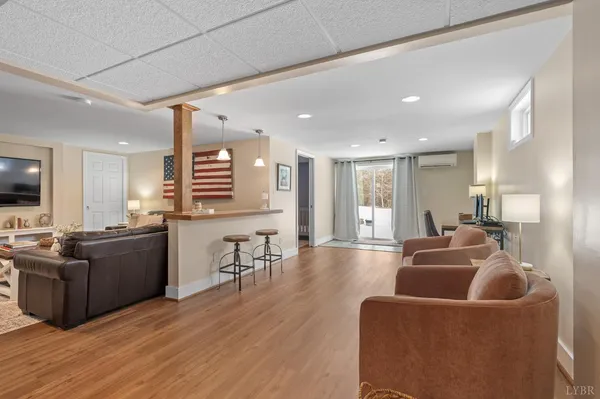 a living room with furniture and a table