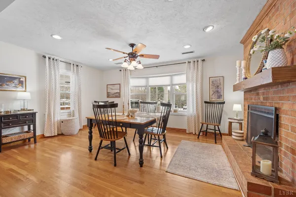 a view of a dining room and a wooden floor