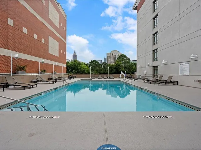 a view of a lake with a building in the background