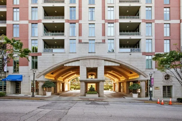 a front view of a building with street view