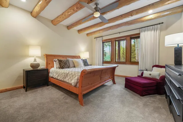 a bedroom with furniture and window