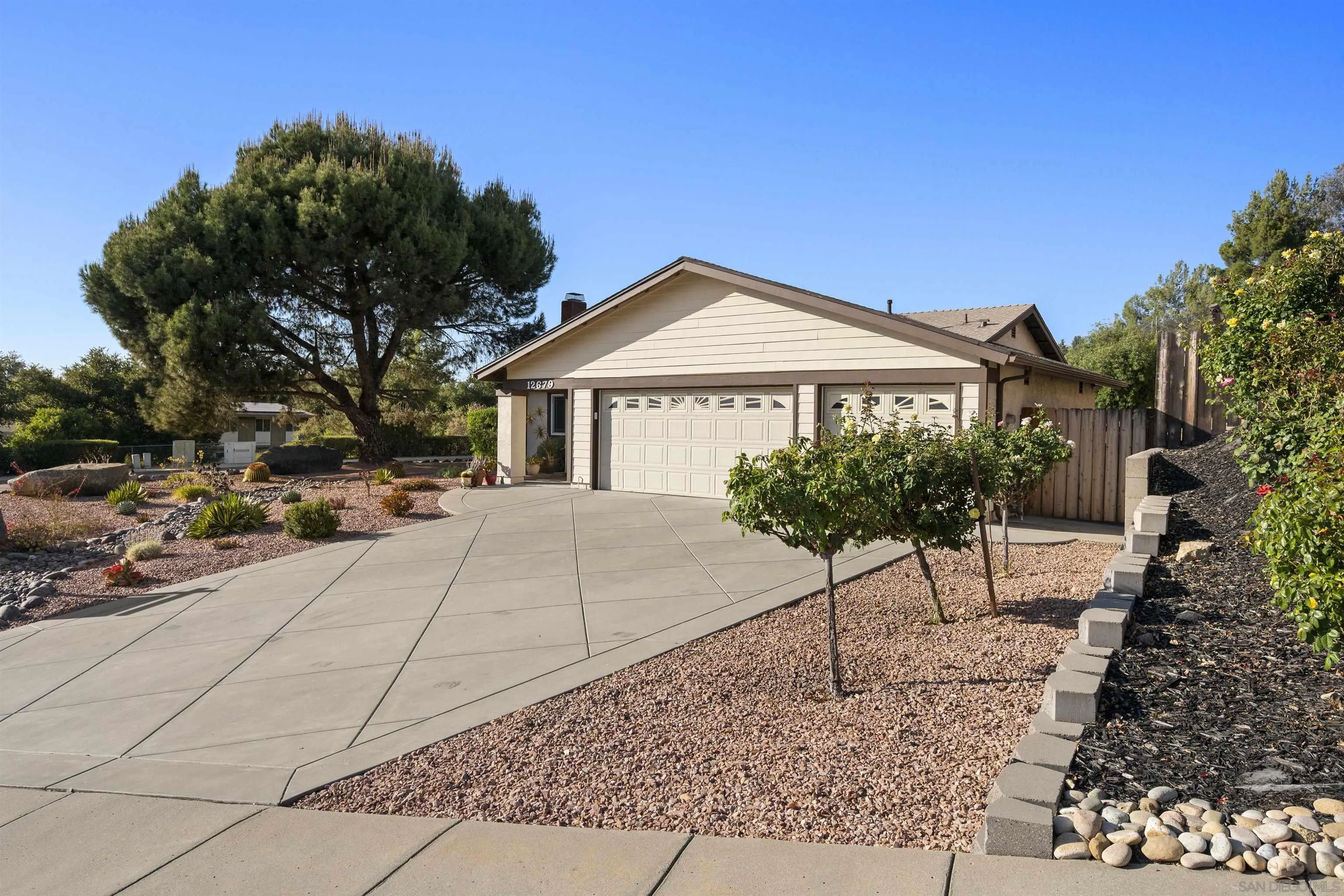 12679 Ridgeton Drive Lakeside, CA 92040 - Photo 2 of 33 a front view of a house with a garden
