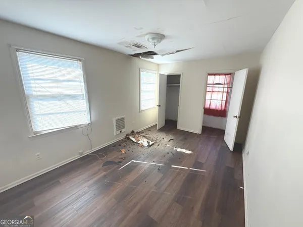 a view of livingroom with hardwood floor and window