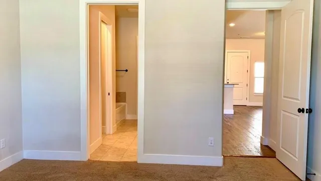 a view of a bathroom with a glass door