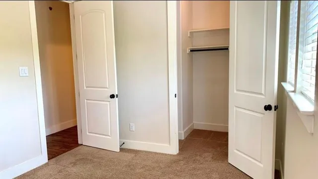 a view of a room with an empty space