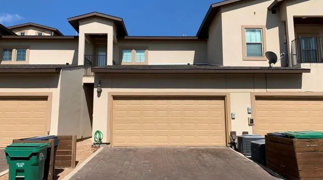 front view of a house with a garage
