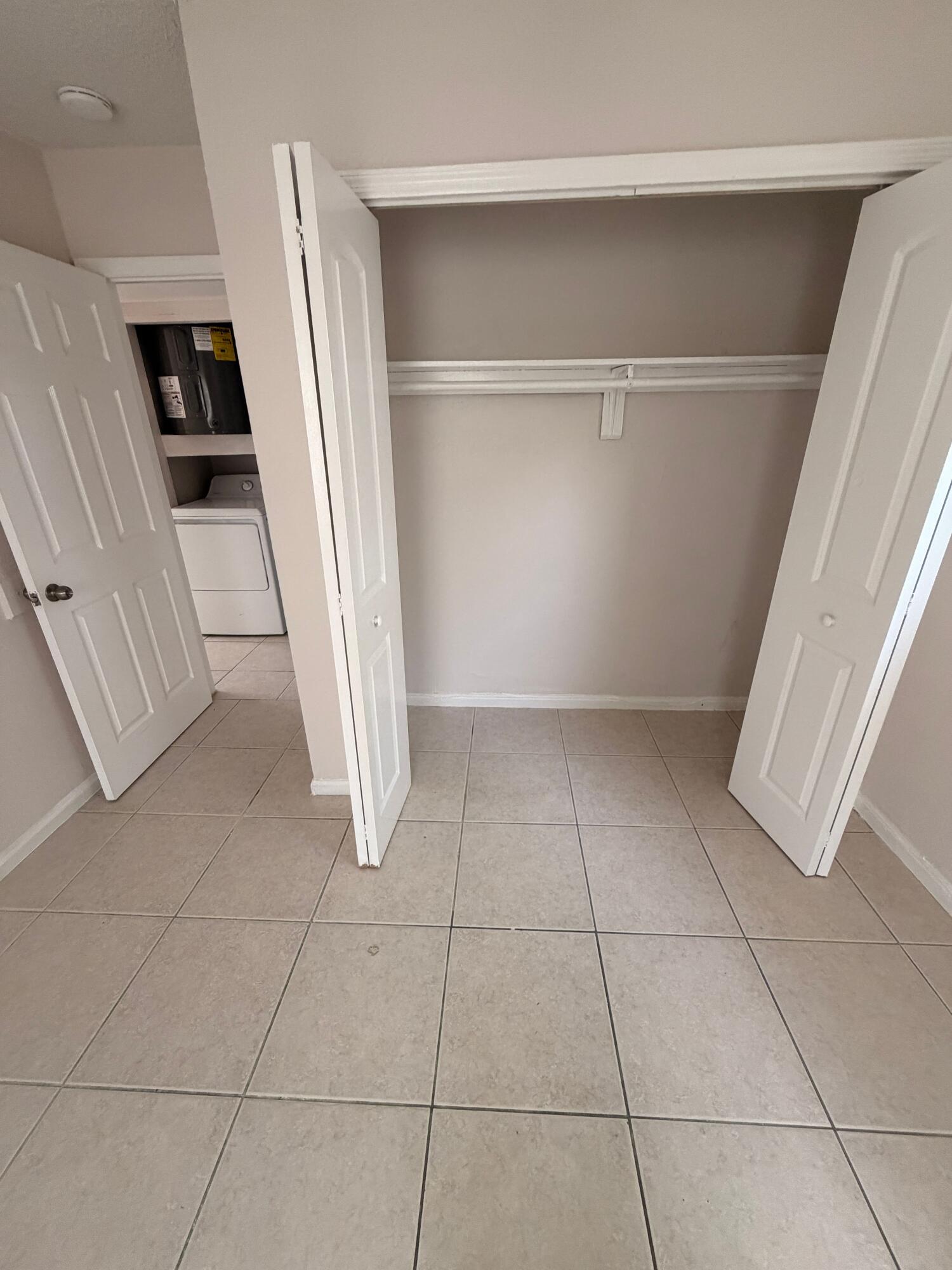 1618 West 26th Court, Unit A Riviera Beach, FL 33404 - Photo 9 of 15 a view of an empty room with a sink