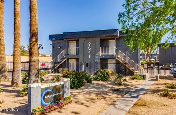 a front view of a building with street view