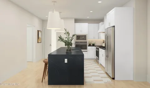 a living room with kitchen island granite countertop furniture and a fireplace