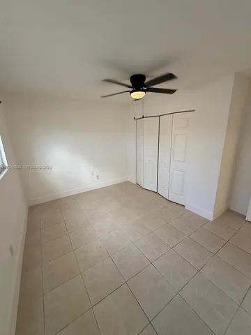 a view of a livingroom and entryway