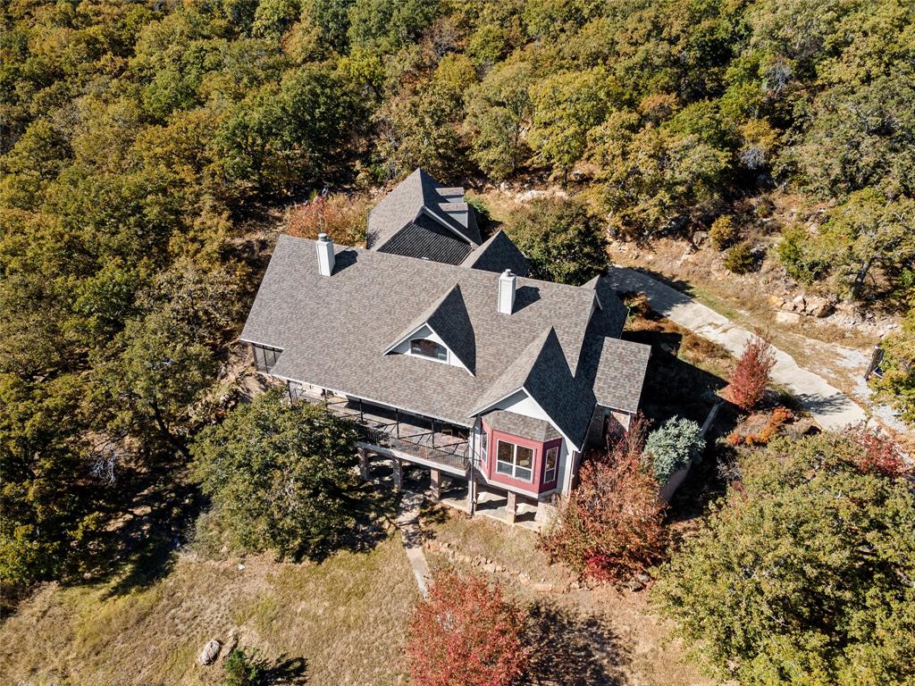 396 Ranchview Court Bowie, TX 76230 - Photo 29 of 38 an aerial view of a house with a yard