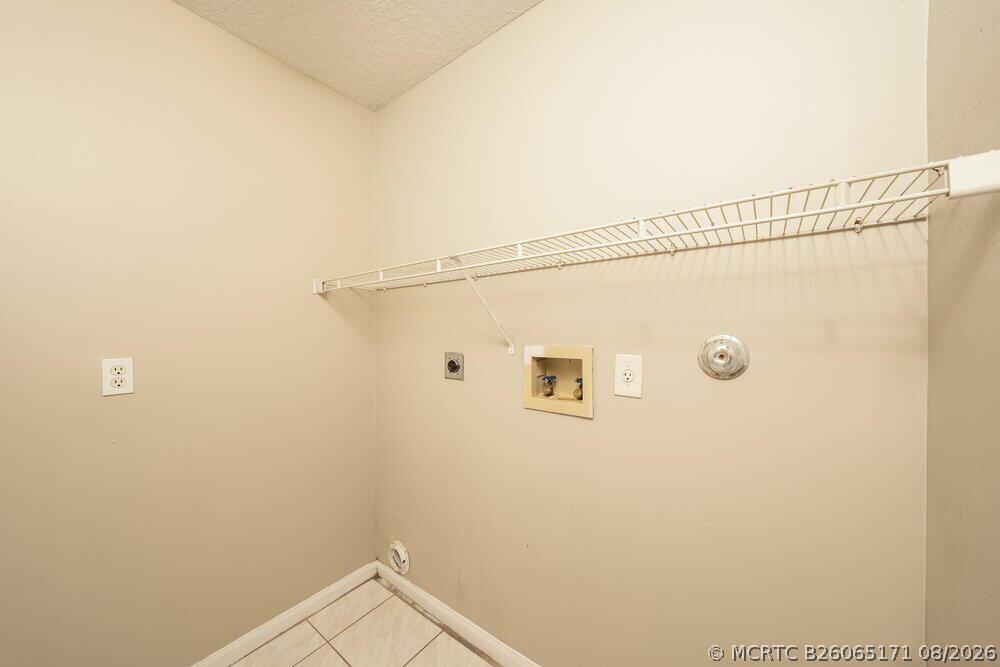 Undisclosed Address Boca Raton, FL 33428 - Photo 13 of 16 14-LaundryRoom_20260728173046-lg