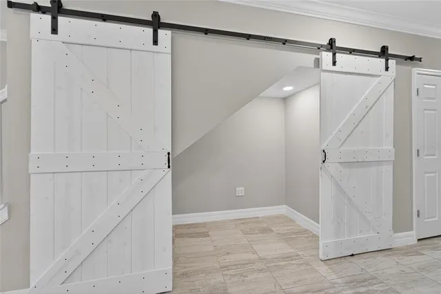 a view of a utility room with closet