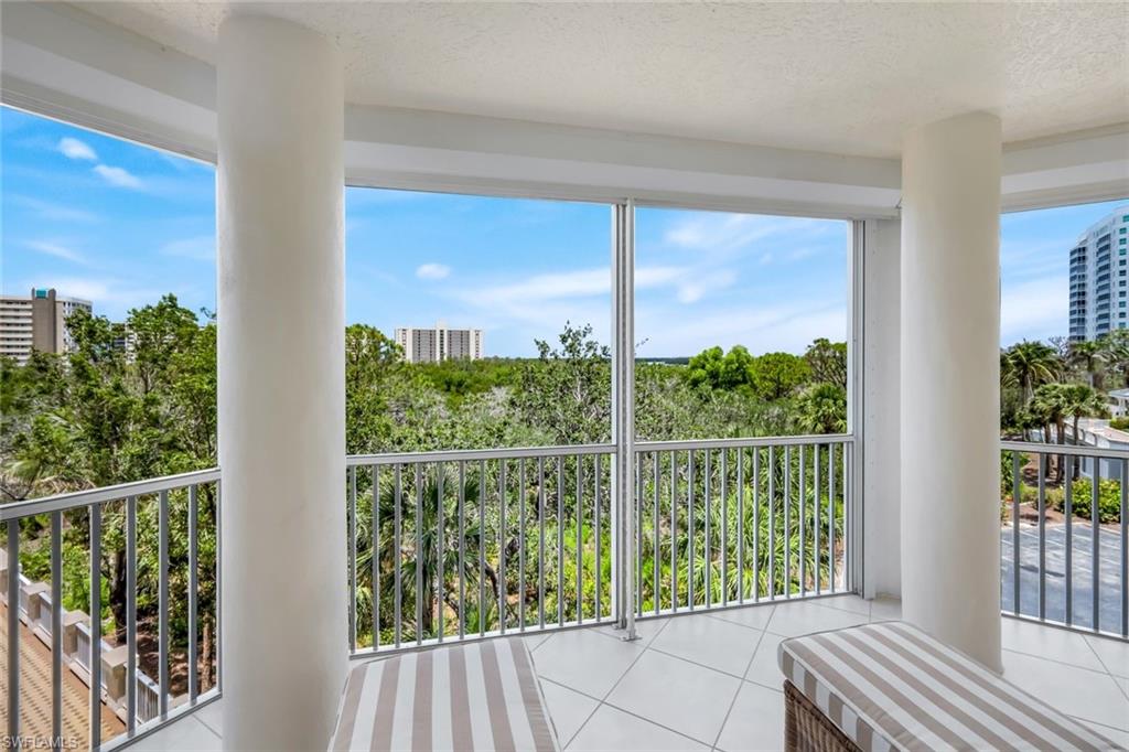315 Dunes Boulevard, Unit 307 Naples, FL 34110 - Photo 28 of 44 a view of a balcony with lake view