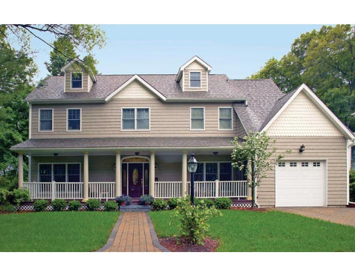 100 Walnut Hill Road Newton, MA 02461 - Photo 1 of 5 a front view of a house with a yard