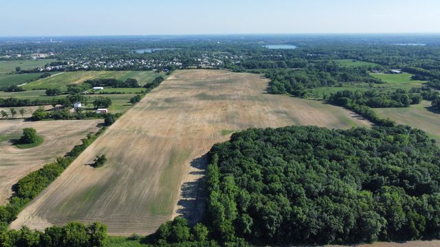 an aerial view of a house with a garden
