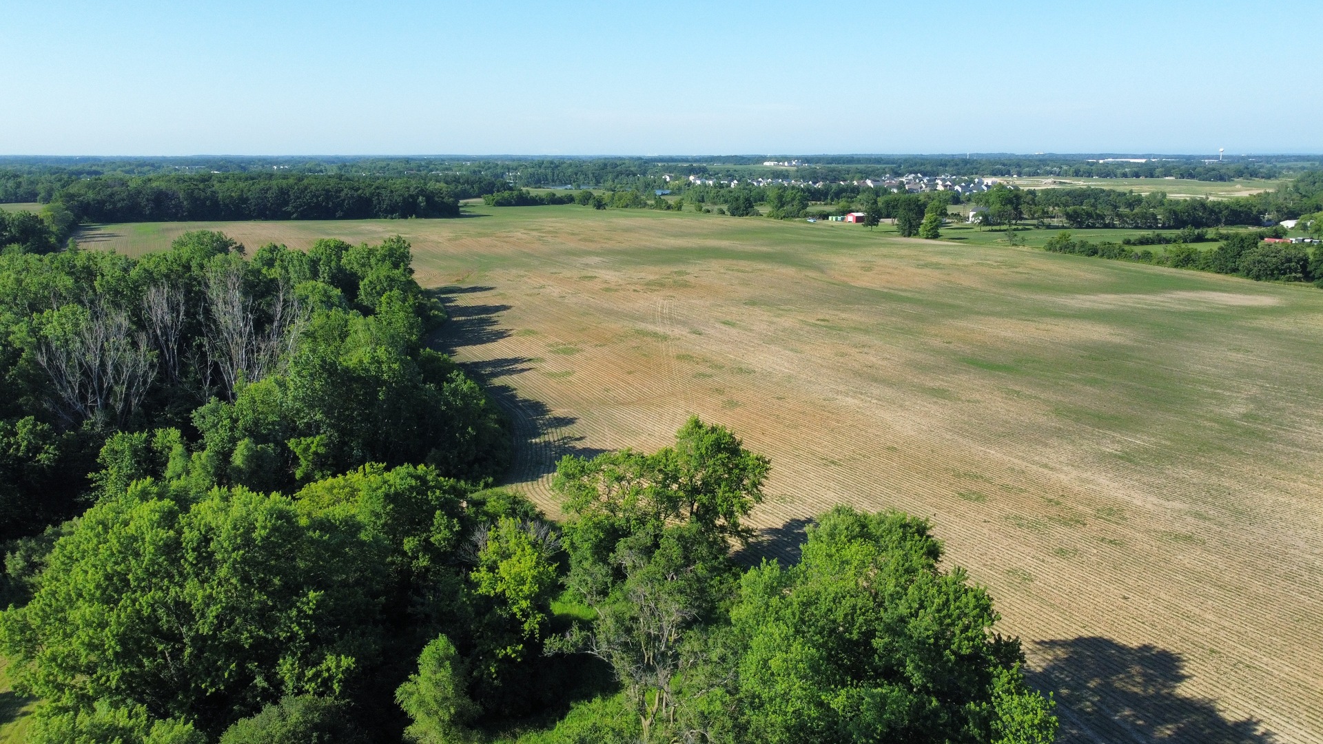 21210 West Grass Lake Road Lake Villa, IL 60046 - Photo 5 of 14 a view of a lake with houses in the back