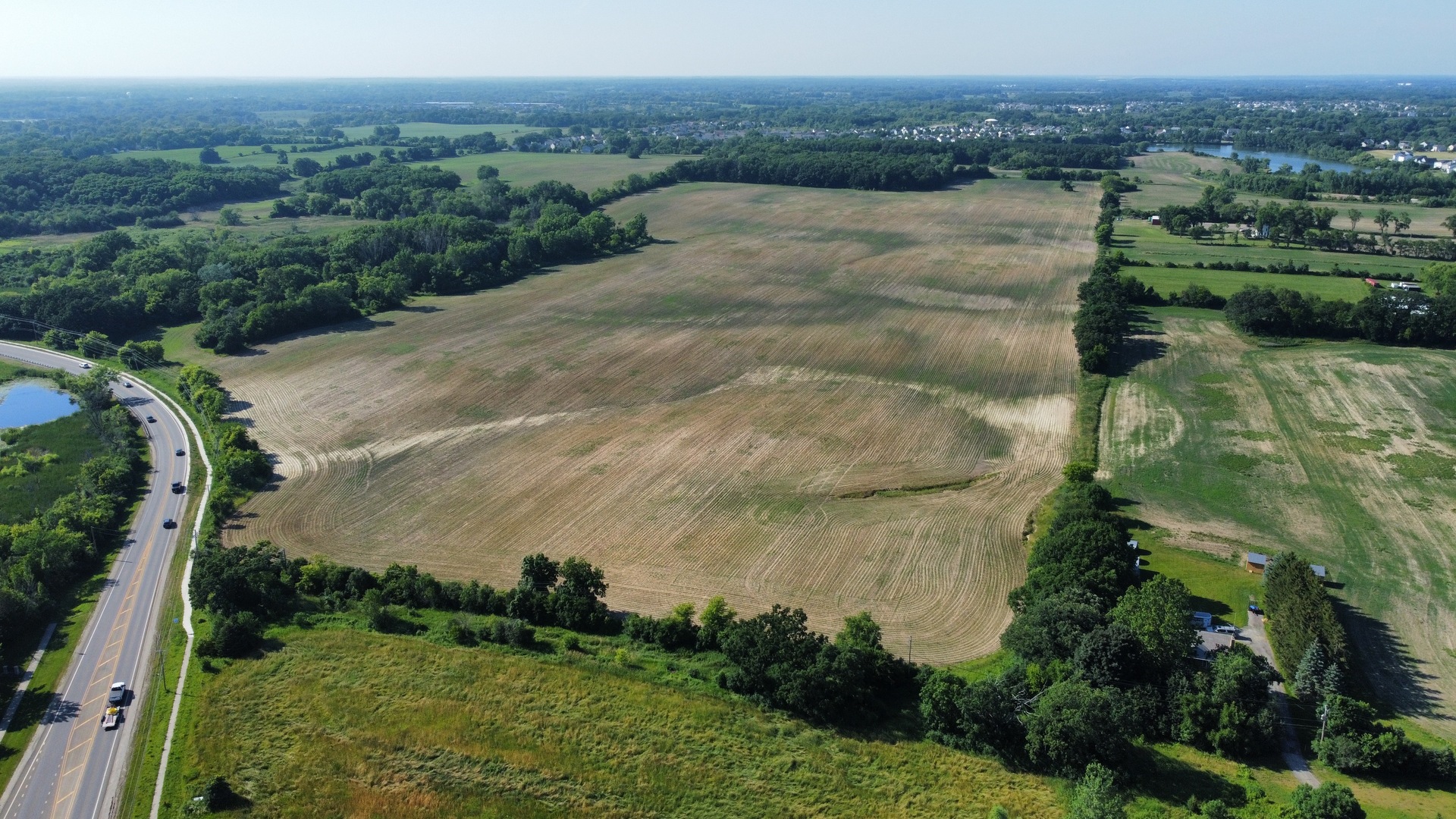 21210 West Grass Lake Road Lake Villa, IL 60046 - Photo 8 of 14 a view of a lake with a mountain in the back