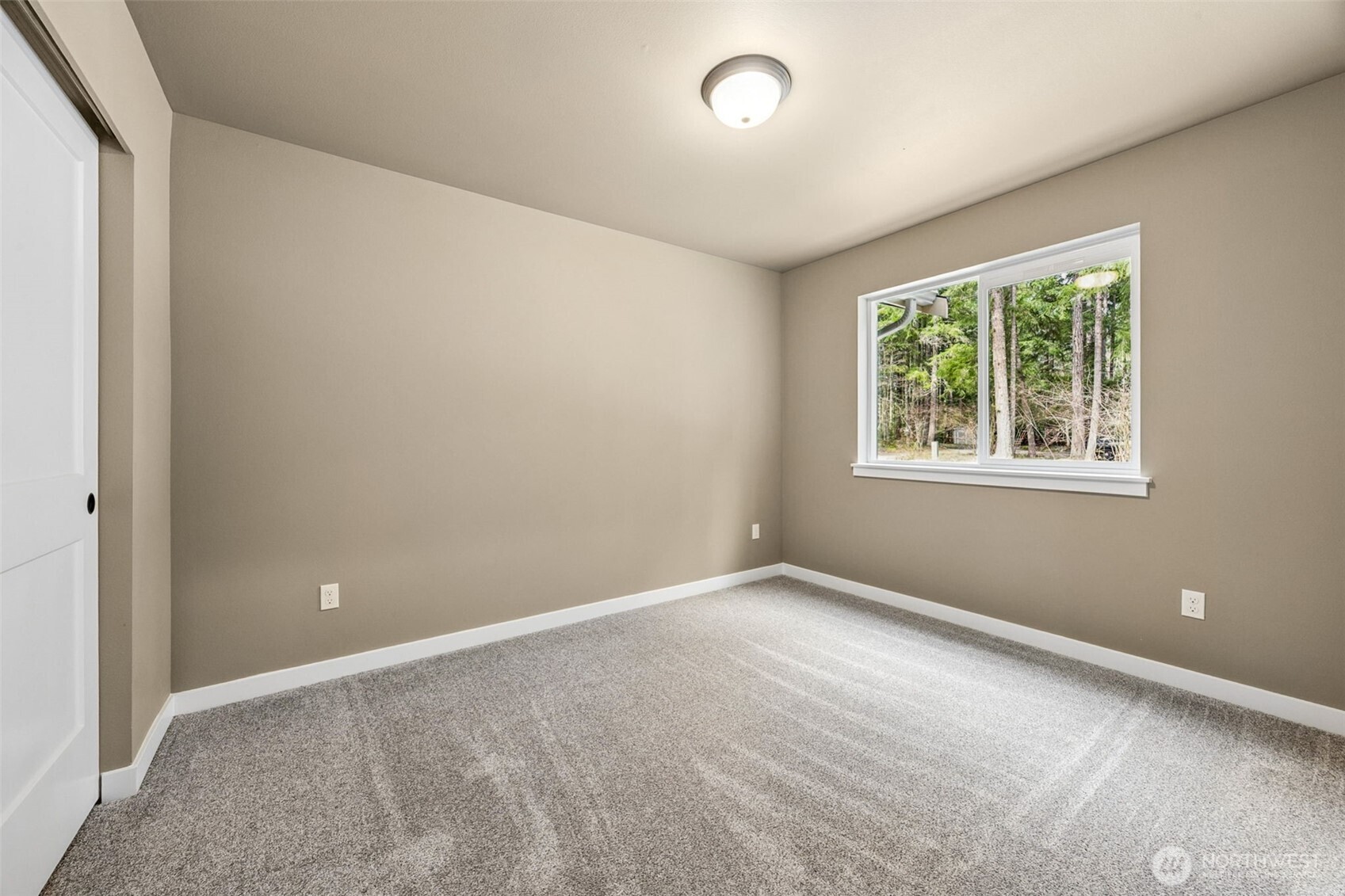 18410 Rampart Drive Southeast Yelm, WA 98597 - Photo 12 of 30 an empty room with windows and closet