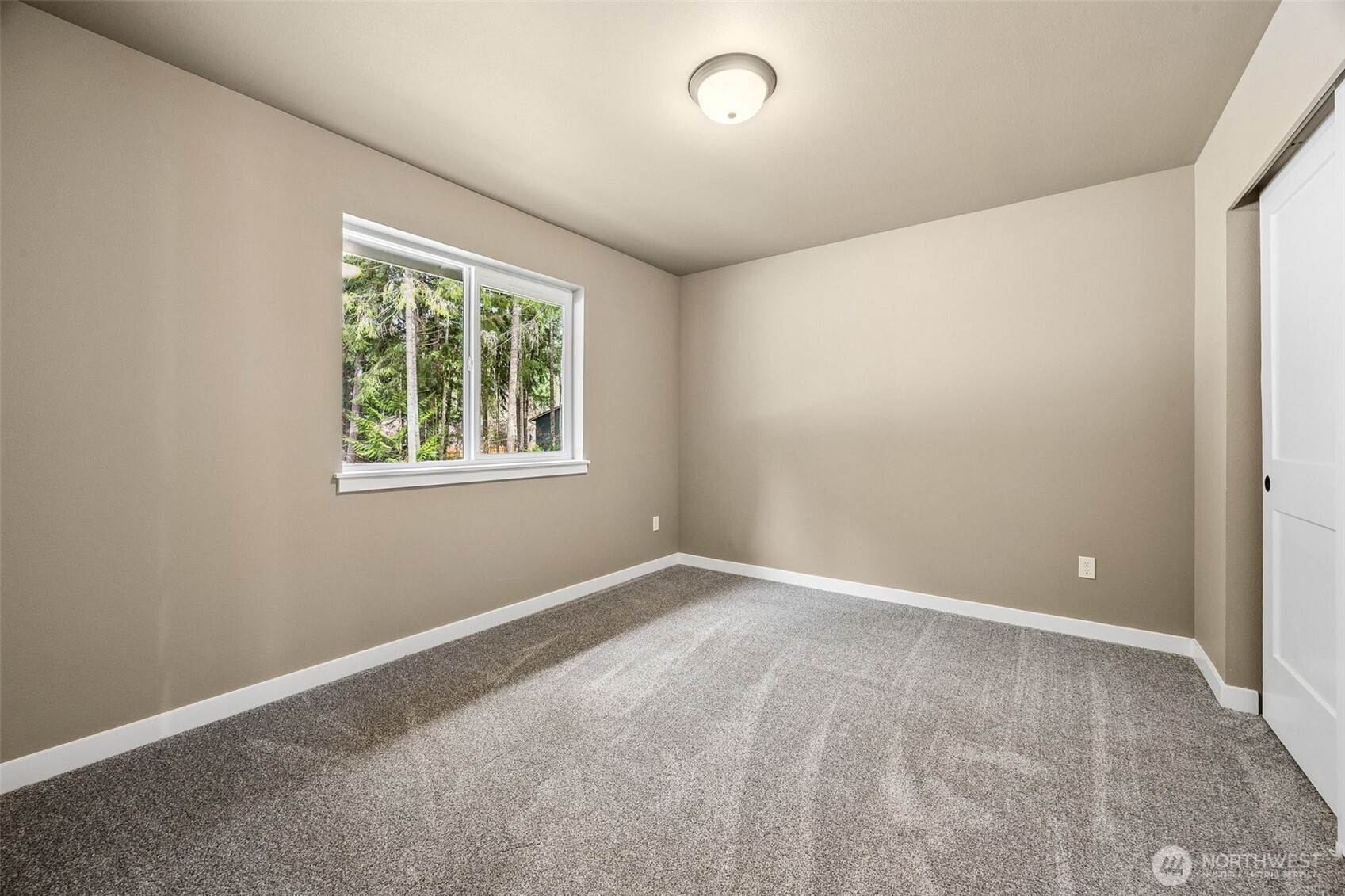 18410 Rampart Drive Southeast Yelm, WA 98597 - Photo 14 of 30 an empty room with windows
