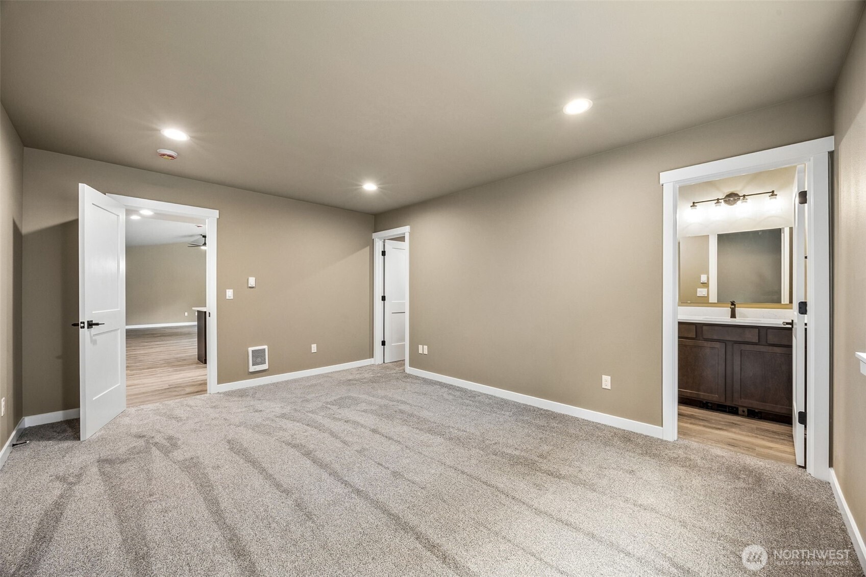 18410 Rampart Drive Southeast Yelm, WA 98597 - Photo 15 of 30 a view of a big room with a bathroom and a sink