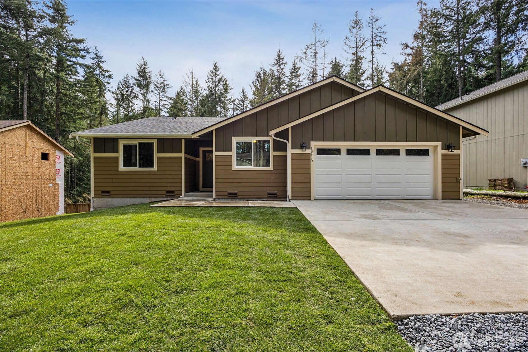 18410 Rampart Drive Southeast Yelm, WA 98597 - Photo 2 of 30 a front view of house with yard and green space