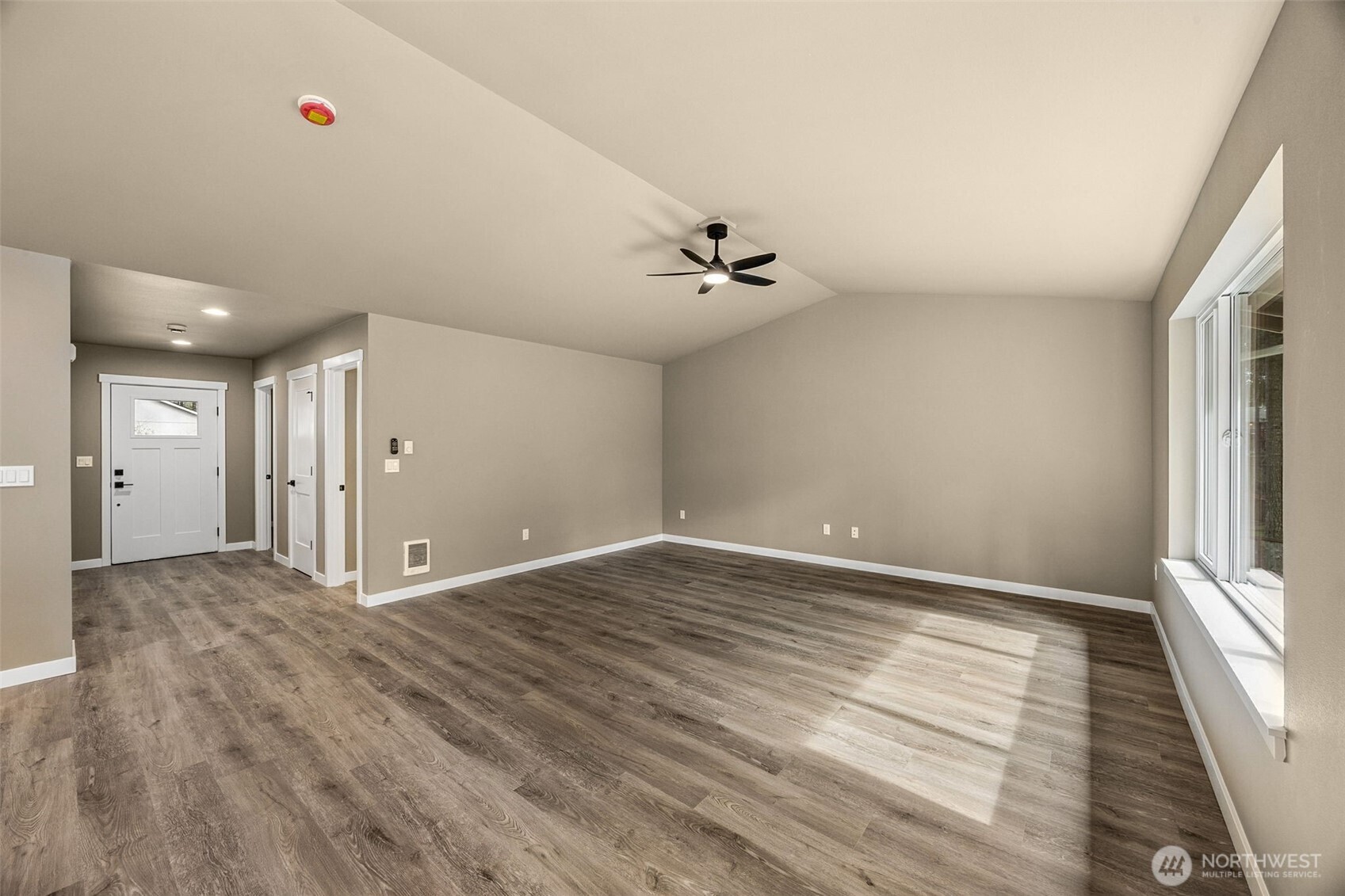 18410 Rampart Drive Southeast Yelm, WA 98597 - Photo 5 of 30 a view of an empty room with a window
