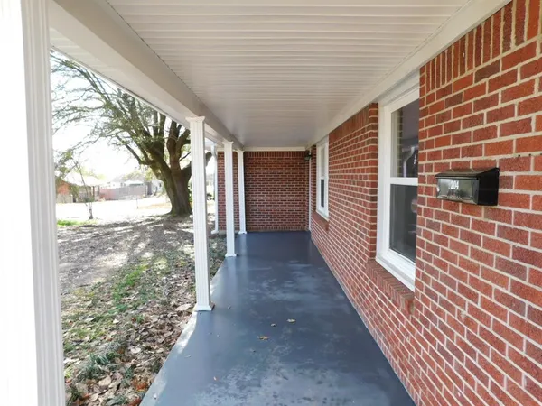a view of a pathway both side of building