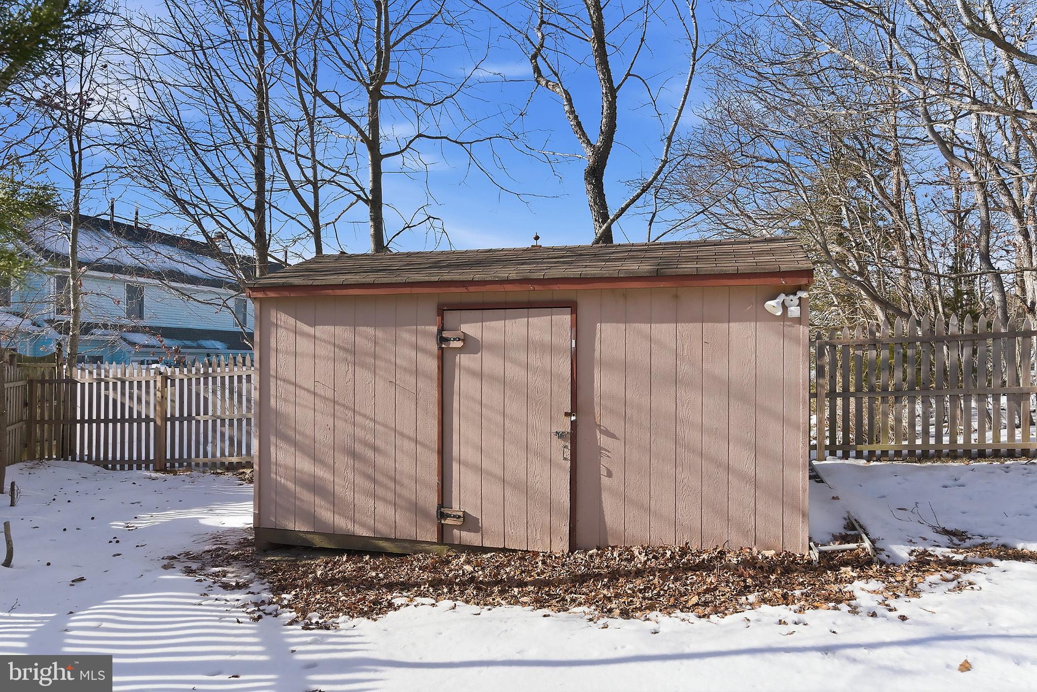 31 Hillcrest Lane Tuckerton, NJ 08087 - Photo 27 of 33 a side view of a house with a yard
