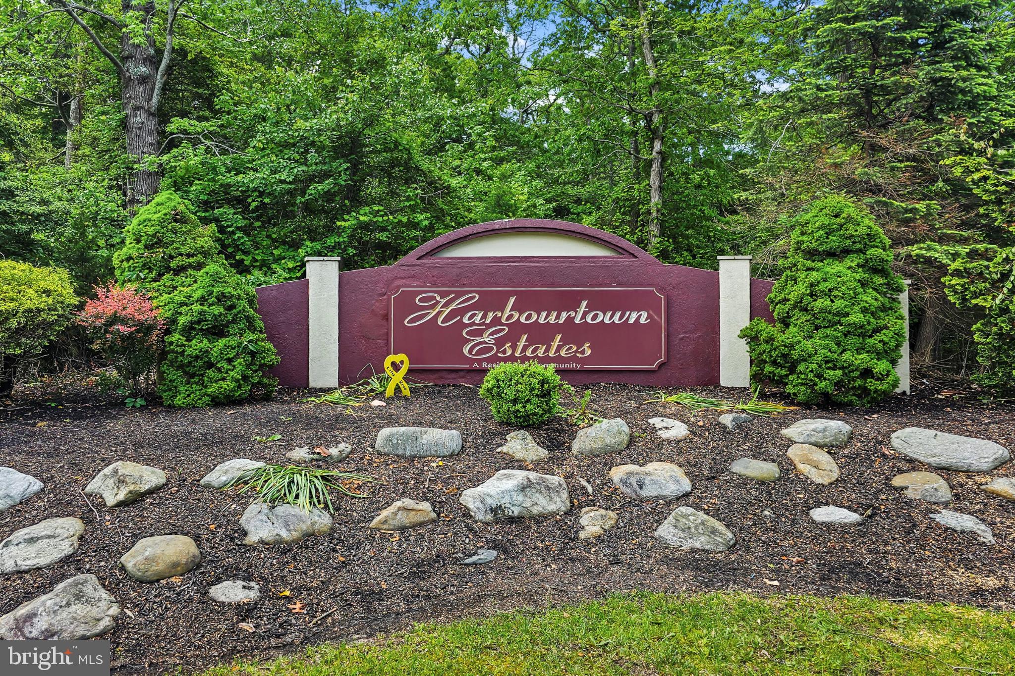 31 Hillcrest Lane Tuckerton, NJ 08087 - Photo 30 of 33 a sign that is sitting on a brick wall