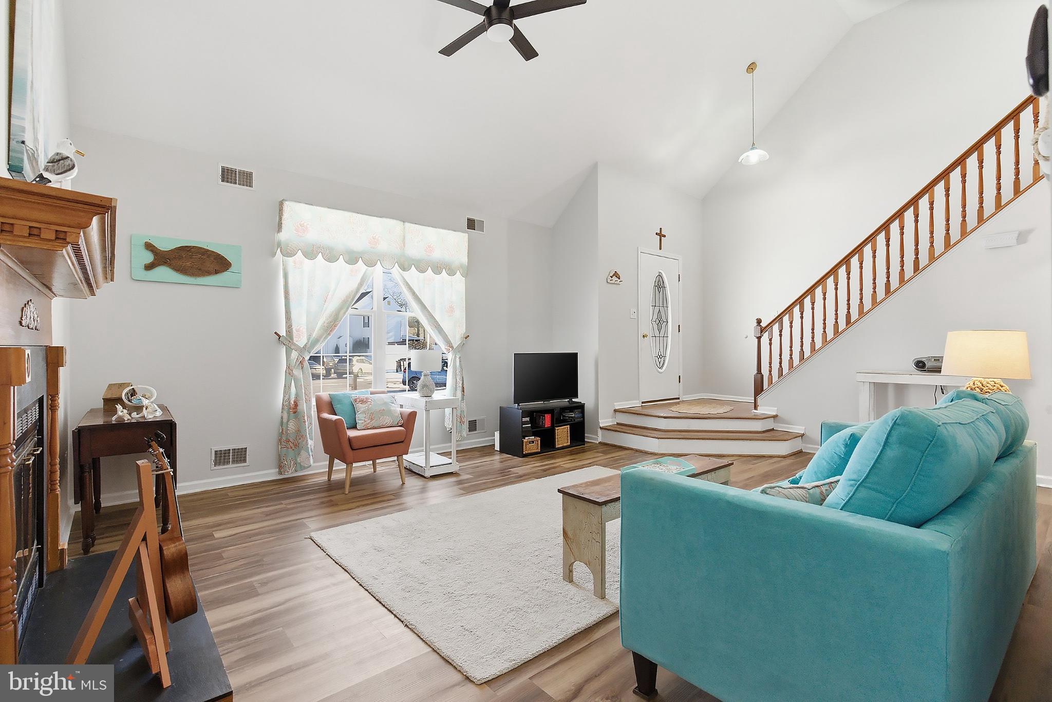 31 Hillcrest Lane Tuckerton, NJ 08087 - Photo 6 of 33 a living room with furniture a rug and a flat screen tv