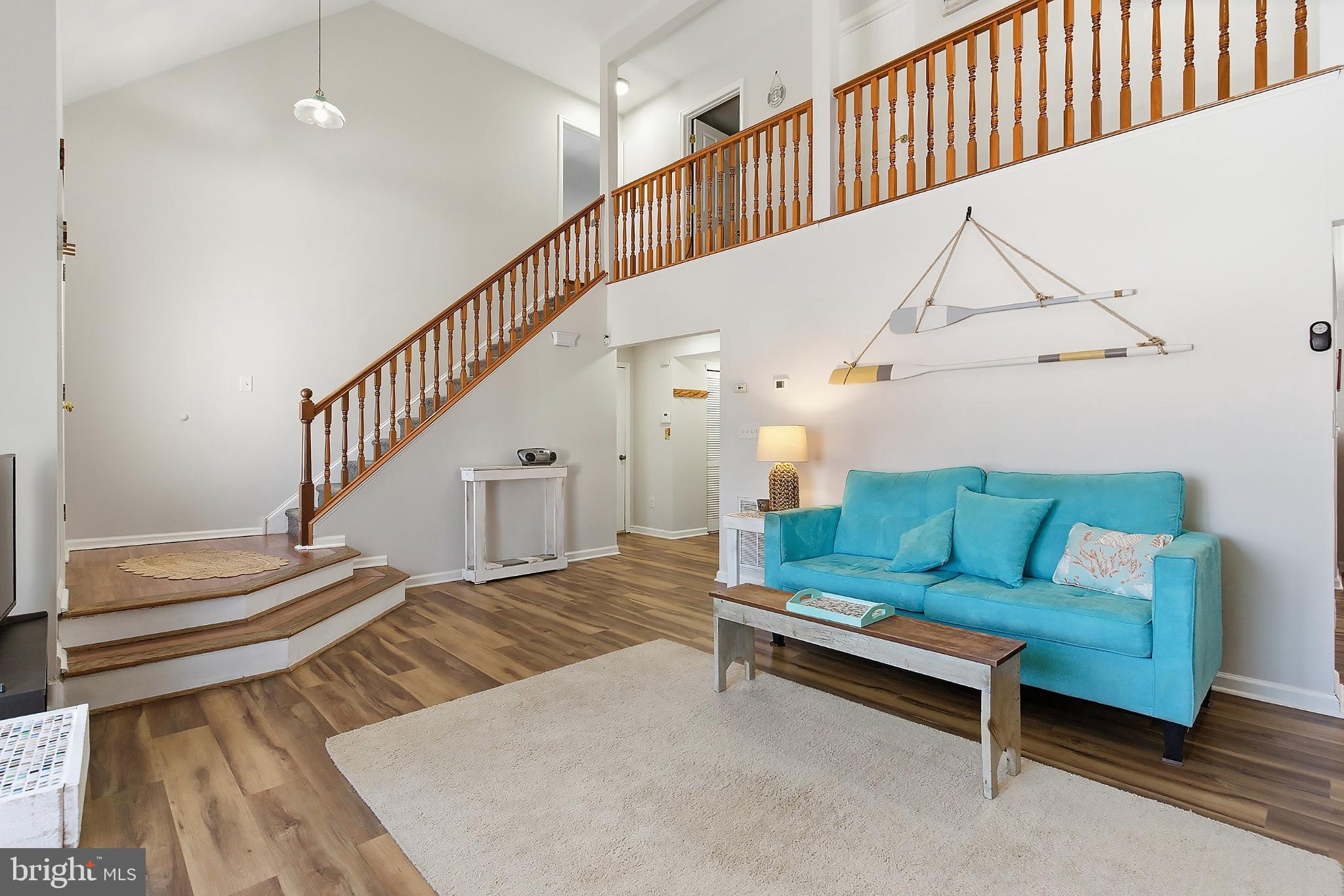 31 Hillcrest Lane Tuckerton, NJ 08087 - Photo 7 of 33 a living room with stairs and a wooden floor