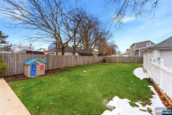 a view of a backyard with a garden