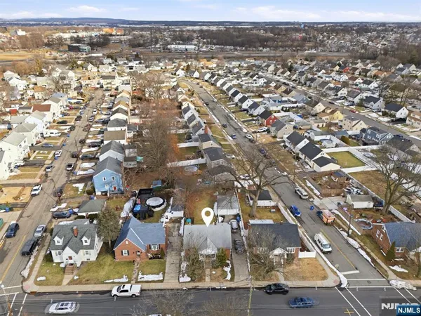 an aerial view of residential building with parking space