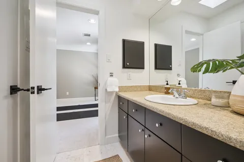 a building outdoor space with patio furniture and potted plants