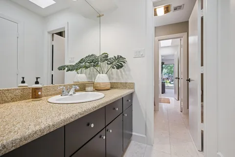 a view of a building with sitting area