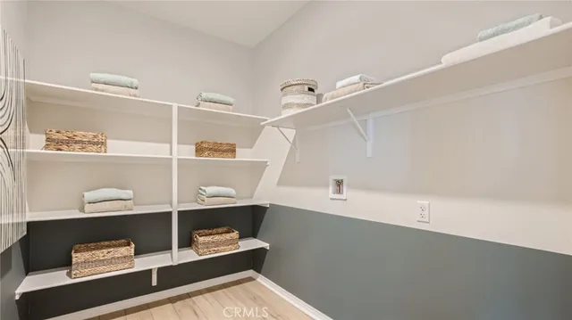 a view of workspace with cabinets