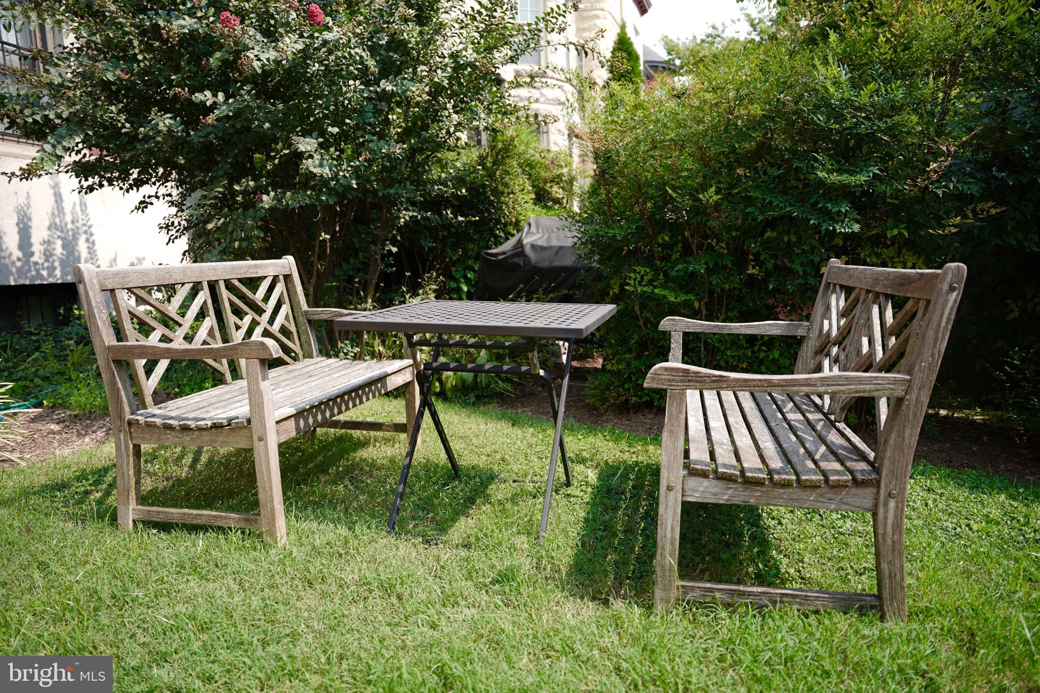 1321 Fairmont Street Northwest, Unit 3 Washington, DC 20009 - Photo 12 of 13 a view of a chairs in a backyard