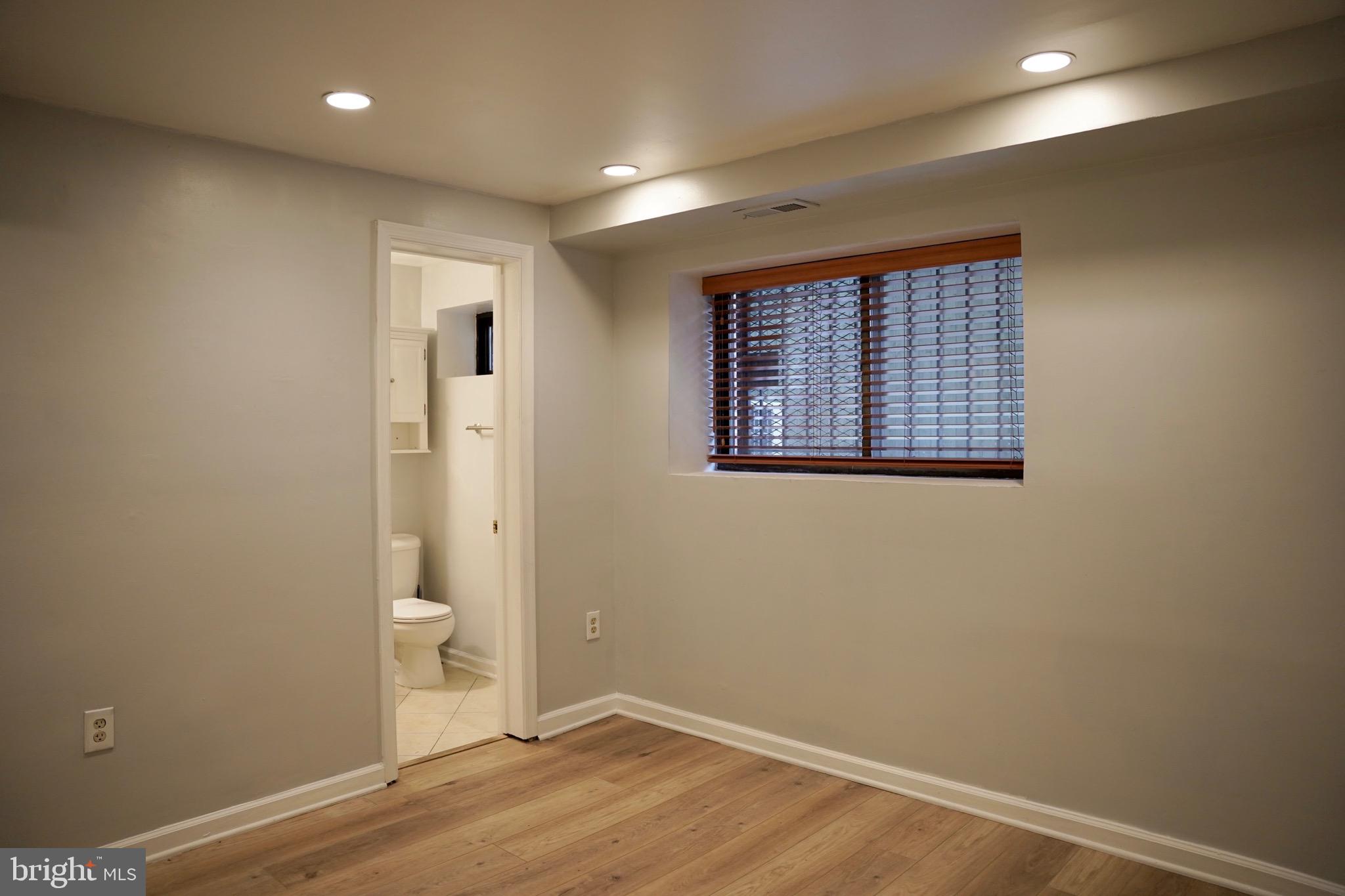 1321 Fairmont Street Northwest, Unit 3 Washington, DC 20009 - Photo 9 of 13 a view of a bathroom with a toilet and a sink
