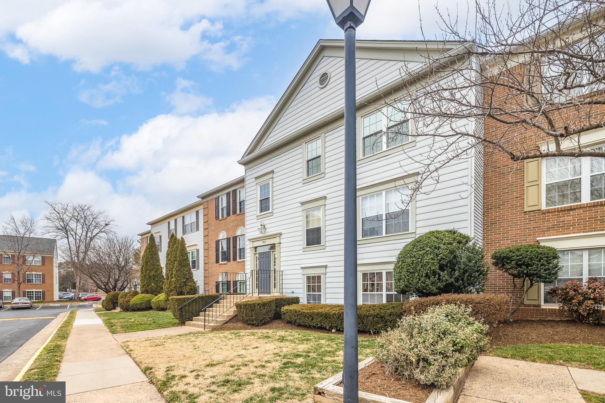 9210 Caspian Way, Unit 302 Manassas, VA 20110 - Photo 22 of 40 a view of a building in the background